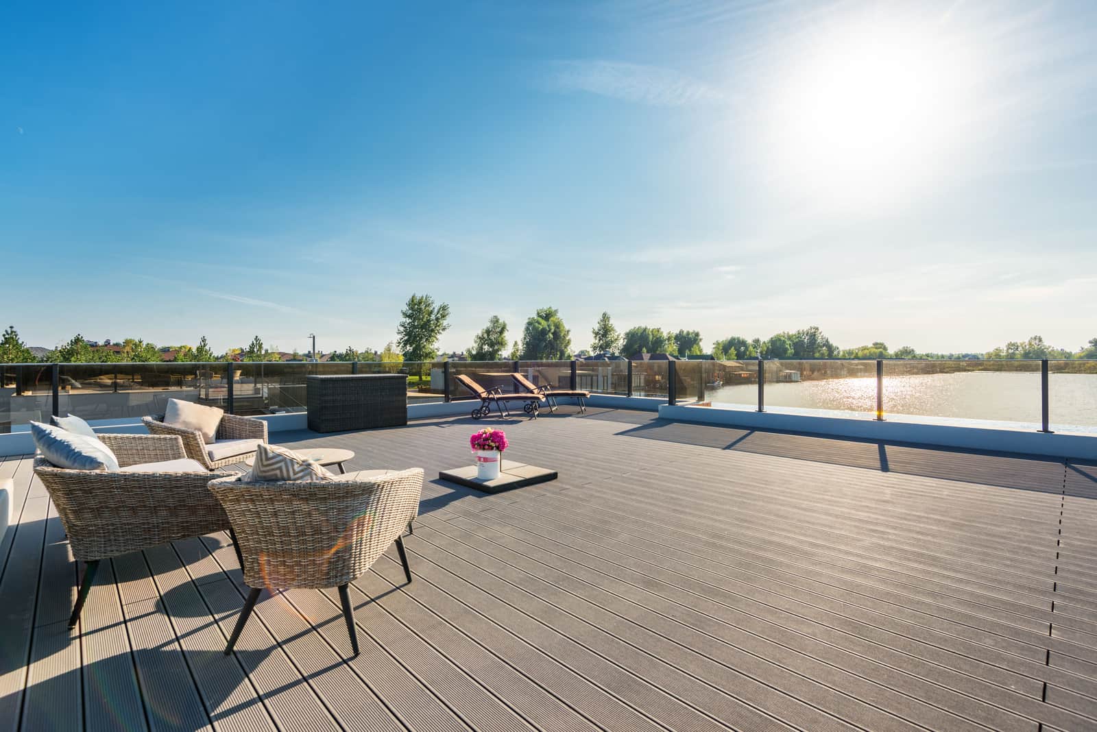 Bright sunlight falling across an outdoor terrace