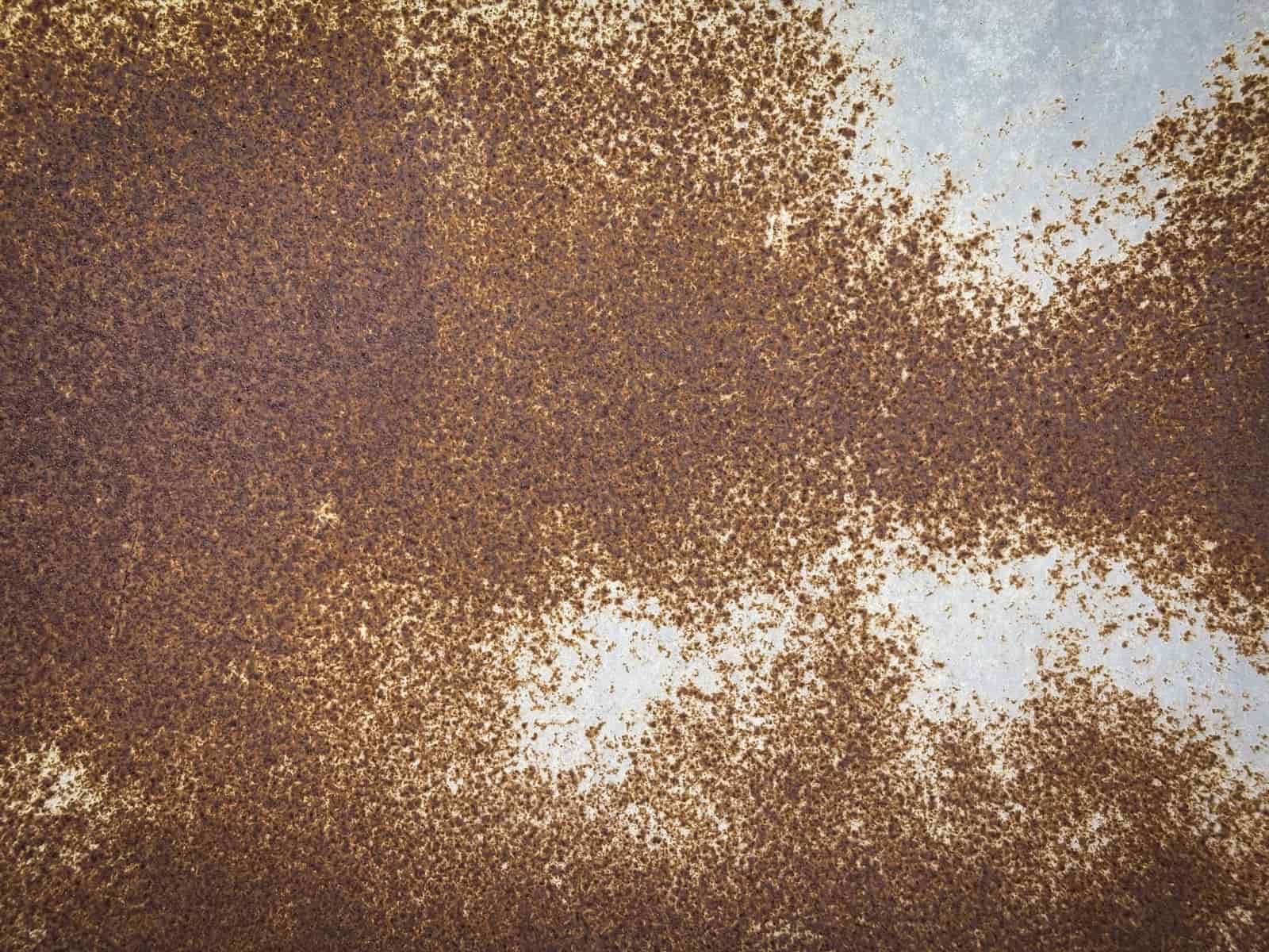 Close-up of corroded metal showing rust texture