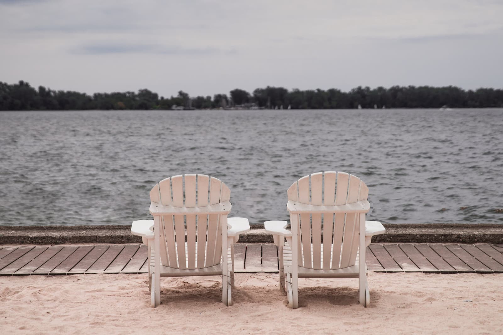 HDPE poly lumber Adirondack chair on a weathered deck