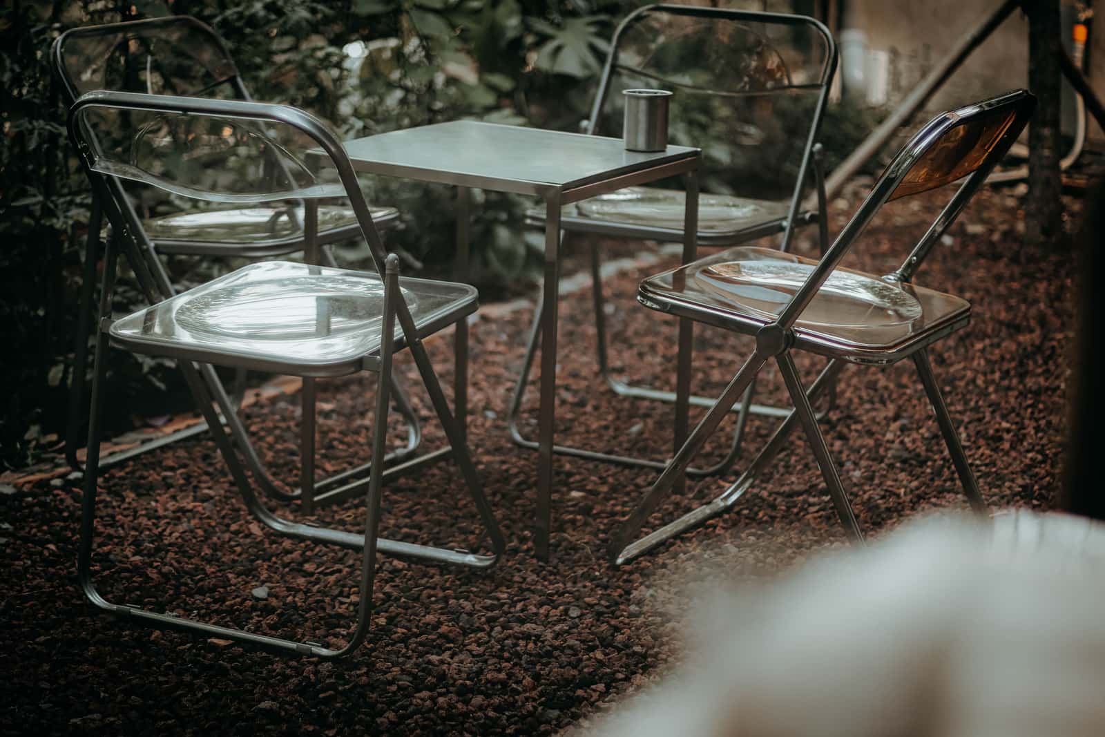 Cast aluminum patio dining table and chairs