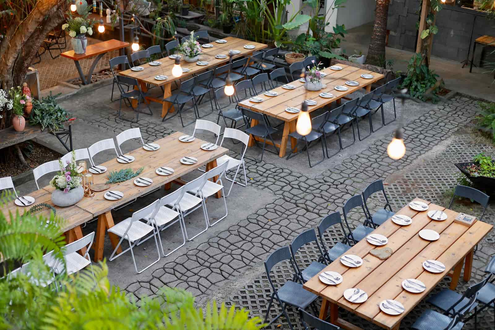 Poly lumber outdoor dining table and chairs on a deck