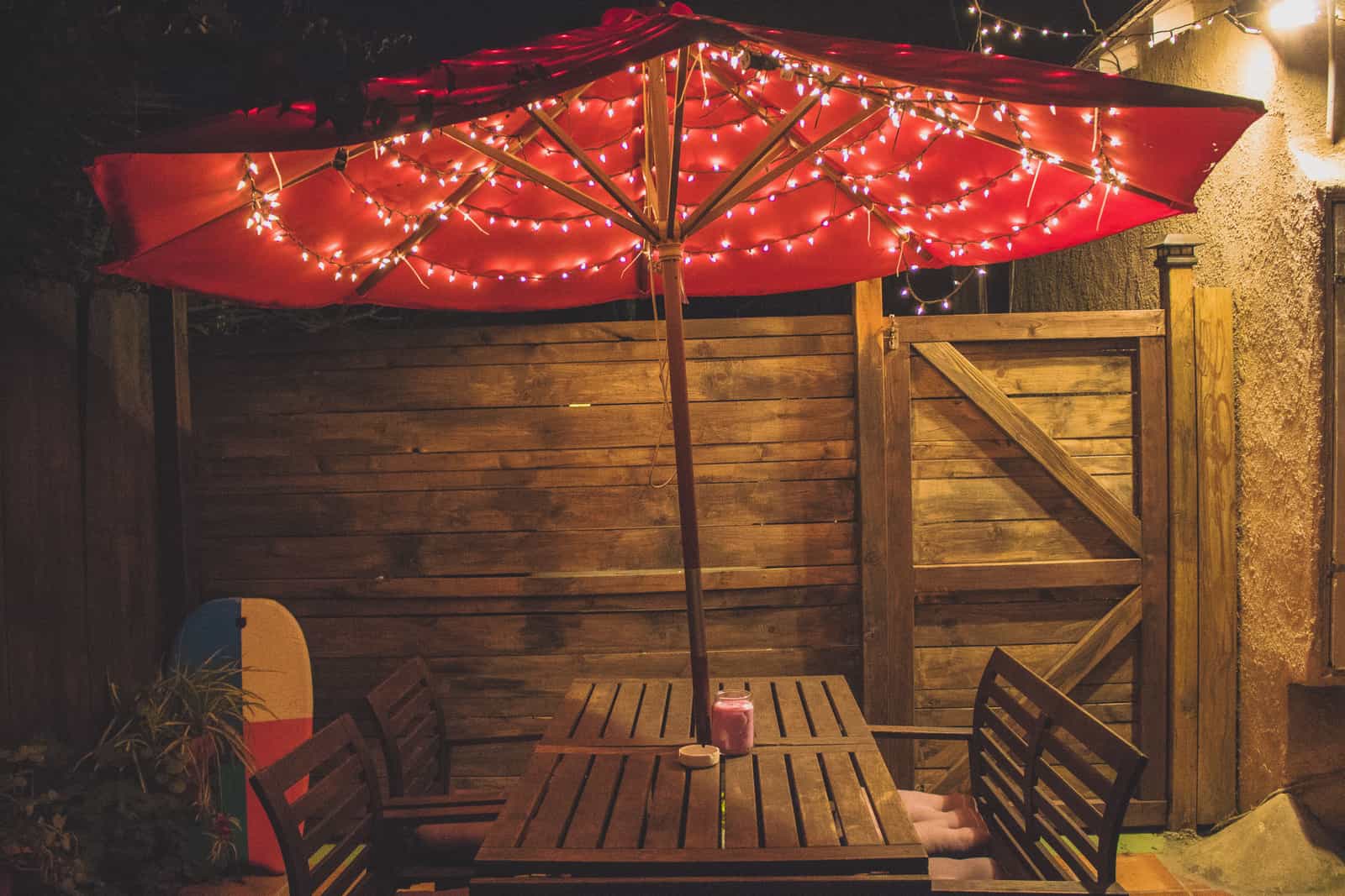 Vented three-tier patio umbrella on a bright deck